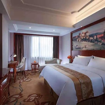 Vienna International Hotel Shaoguan Fengcailou Esterno foto
